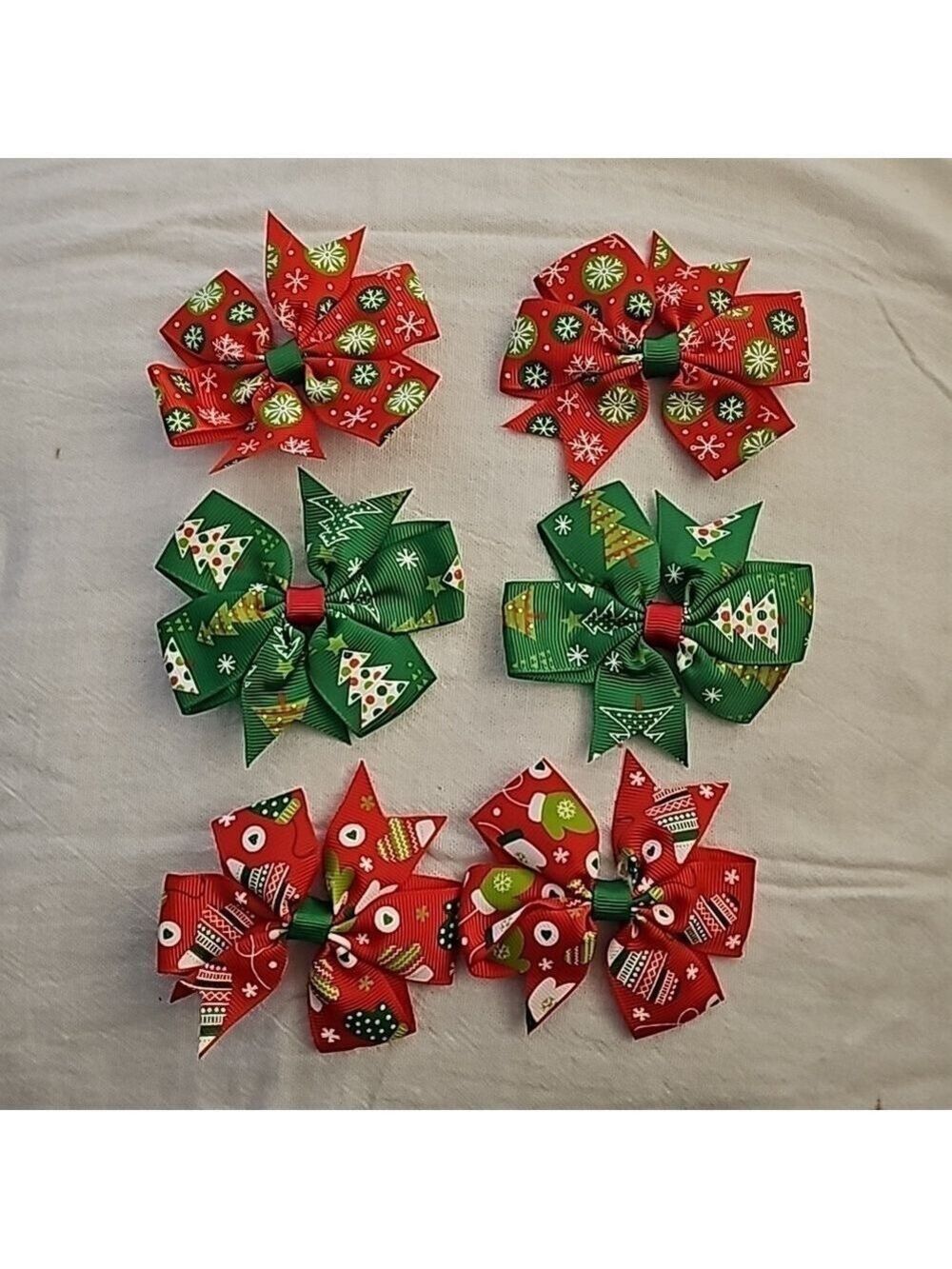 Three pair of christmas hair bows
